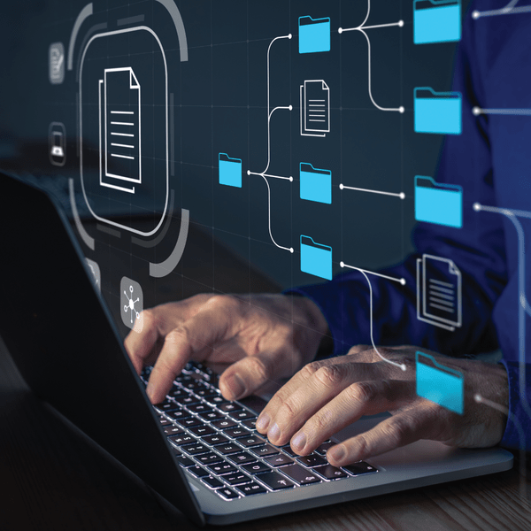 Man typing on computer using a xero accounting software